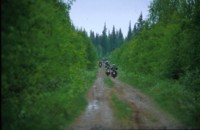 Allroad Tour jytisee eteenpin kohti Posiota jossakin Pyhityksen ja Kostonjrven seuduilla.<br>Thunder in the bushes.